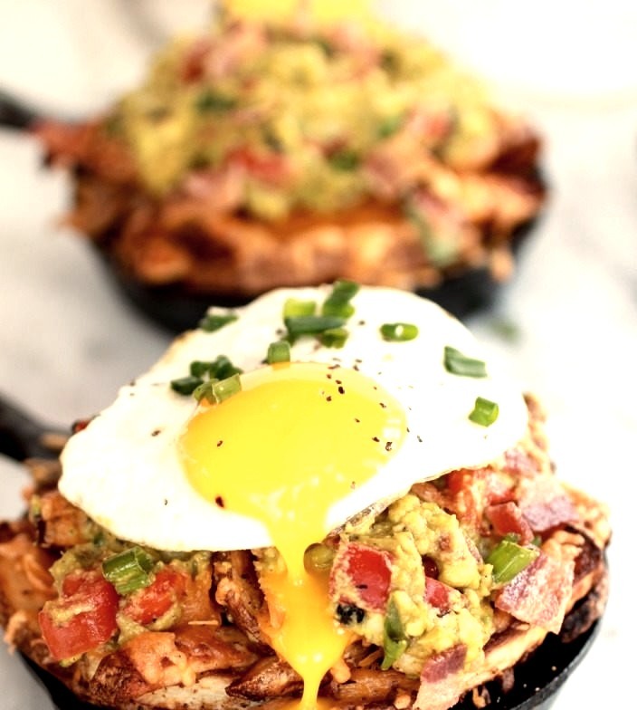 Cheesy Cajun Fries with Guacamole, Bacon, and Fried Eggs