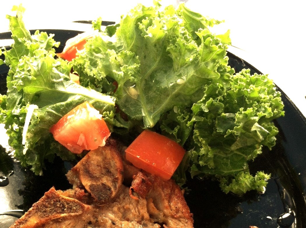 Pork Chop with Kale SaladFilipinos also eat crispy golden browned pork chop.